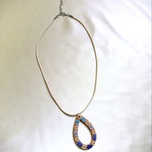 Handmade acrylic pendant with turtles and flowers